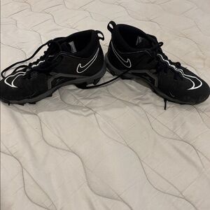 Nike Alpha Black and White Sports Cleats